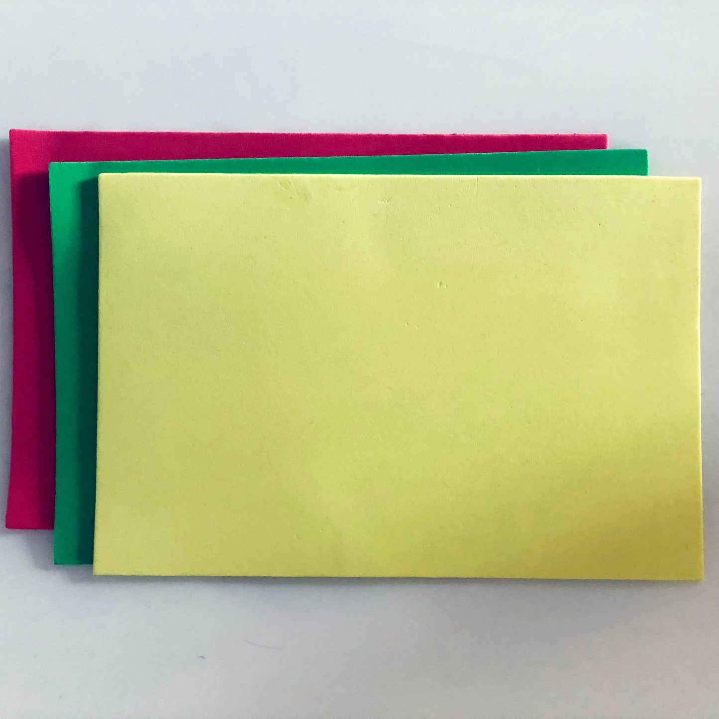 Three sheets of 1 mm foam: red, green and yellow